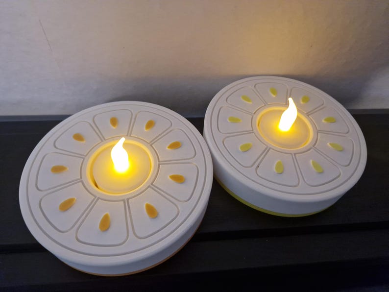 LED Zitrus-Teelichthalter Orange und Zit…